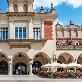 Cracovia: Visita guiada de la ciudad en E-Scooter con degustación de comida